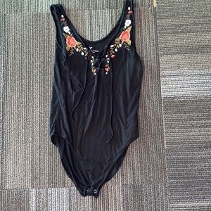Black bodysuit with floral embroidery